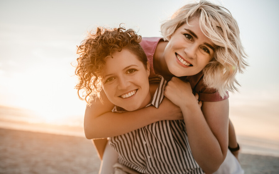 Same sex couple sunset